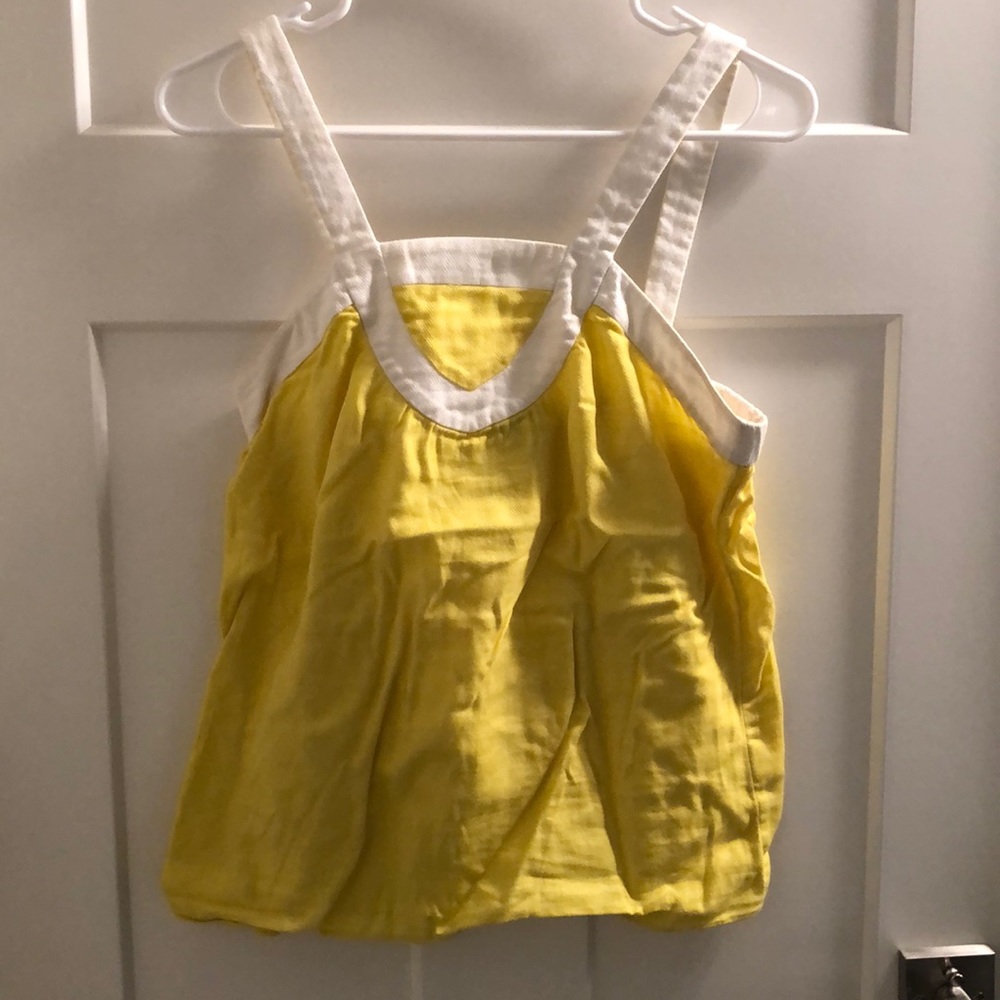 Yellow tank top with white trim